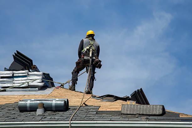 Professional Roof Replacement technician working in Bettendorf, IA